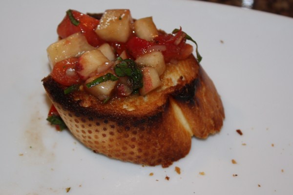 Bruschetta... tomatoes, garlic, basil, olive oil and white nectarines. "Yum" doesn't do the taste justice.
